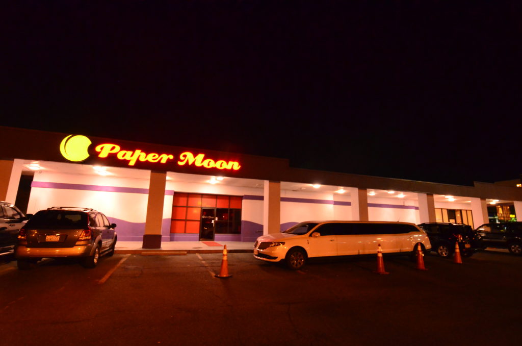 Limo parked out front of a packed Sunday night at Papermoon Springfield.